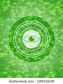 eye icon inside green emblem with triangle mosaic background
