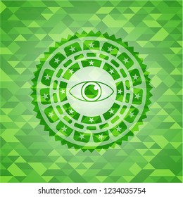 eye icon inside green emblem. Mosaic background