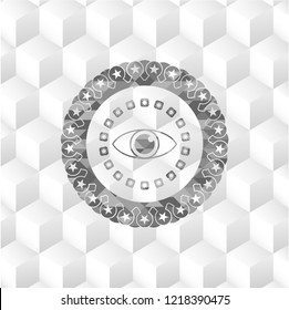 eye icon inside grey emblem with cube white background