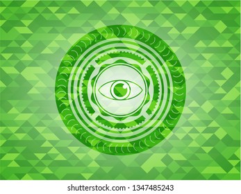 eye icon inside realistic green mosaic emblem