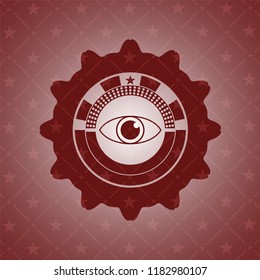 eye icon inside red emblem