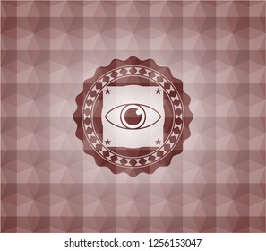 eye icon inside red seamless emblem with geometric pattern background.