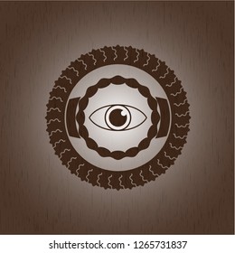 eye icon inside retro style wooden emblem