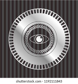 eye icon inside silver emblem or badge