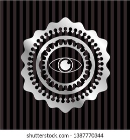 eye icon inside silvery badge