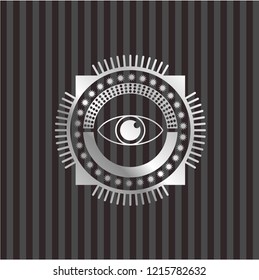 eye icon inside silvery emblem
