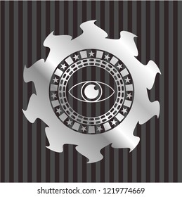 eye icon inside silvery emblem or badge