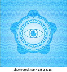 eye icon inside water representation style emblem.