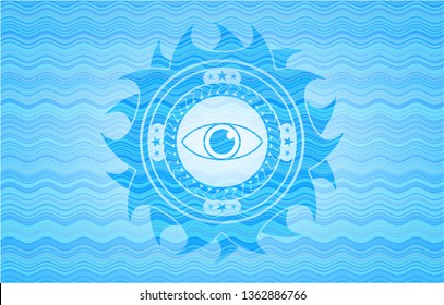 eye icon inside water representation style emblem.
