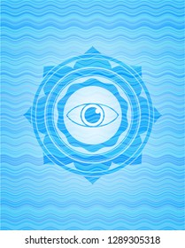 eye icon inside water wave emblem.