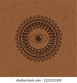 eye icon inside wood emblem