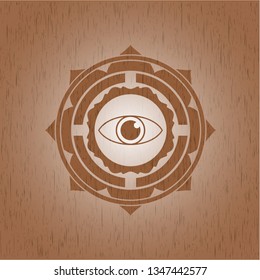 eye icon inside wooden emblem. Vintage.