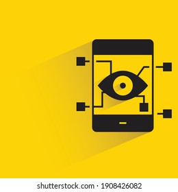 eye scan on smart phone drop shadow on yellow background