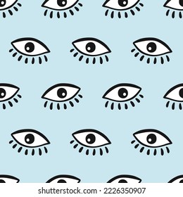 Eye seamless pattern. Vector hand drawn wink, open eyes with lash on blue background