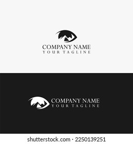 Eye shape logo design combined with mountains.