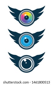 Eye, wing, and camera lens symbols on white background. Vision and media icons.