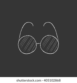 Eyeglasses. Drawn in chalk icon.