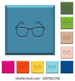 Eyeglasses engraved icons on edged square buttons in various trendy colors