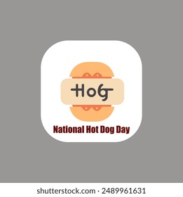 An eye-level medium shot shows a white square with a brown border and the words "national hot dog day" in bold red letters on a gray background.