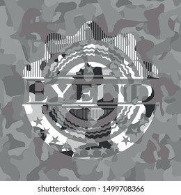 Eyelid on grey camo texture