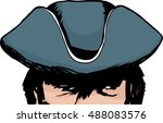 Eyes of face in partial shadow of tricorn hat