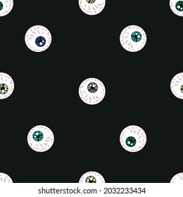 Eyes seamless pattern. Against a dark background. Celebrating Halloween. Suitable for textiles, textured design, paper, printed matter, thematic decoration.