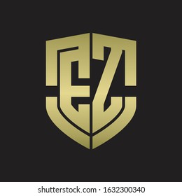 EZ Logo monogram with emblem shield shape design isolated gold colors on black background