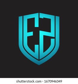 EZ Logo monogram with emblem shield design isolated with blue colors on black background