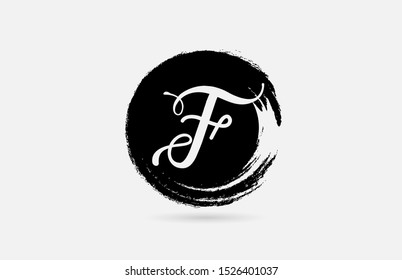 F hand written letter logo alphabet on grunge circle in black and white for icon design. For a logotype on a company or business.