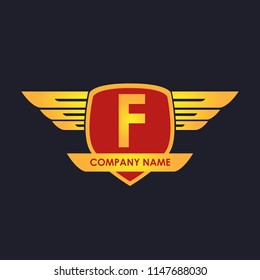 F initial shield with wings gold color logo