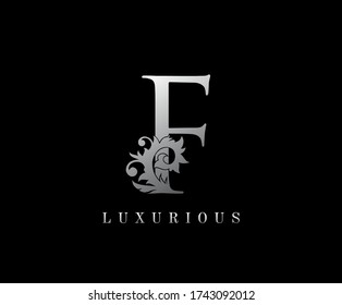 F Letter Floral logo. Vintage silver majestic letter stamp for book design, weeding card, label, business card, Restaurant, Boutique, Hotel. 