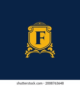 F Letter Initial with Royal Template. Elegant with crown logo vector, Creative Lettering Logo Vector Illustration. Royal shields badges, Coat of Arm Logo Concept.