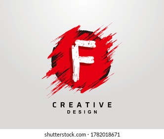F Letra Logo In Circle Grunge Splatter Element. Diseño del icono de explosión de tinta roja de roca.