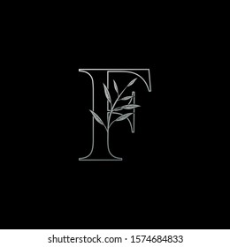 F Letter logo icon, silver outline monogram initial vintage design concept nature leaves with letter F.