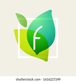 F letter logo in square frame at green leaves watercolor background. Vector ecology typeface for botanical labels, floral headlines, recycle posters, organic cards etc.