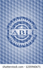 Fable blue emblem with geometric pattern background.