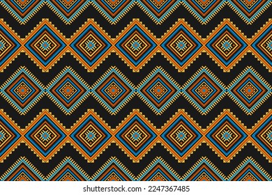 Fabric Aztec pattern background. Geometric ethnic oriental seamless pattern traditional. Mexican style. Design for wallpaper, illustration, fabric, clothing, carpet, textile, batik, embroidery.