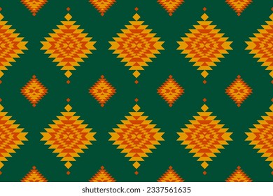 Fabric Aztec pattern background. Geometric ethnic oriental seamless pattern traditional. Mexican style. Design for wallpaper, illustration, fabric, clothing, carpet, textile, batik, embroidery.