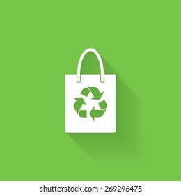 Fabric bag icon with recycling symbol on green background.