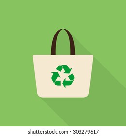 Fabric bag icon with recycling symbol, flat design style. Vector illustration eps 10. 
