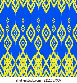 El tejido étnico ikat es un patrón sin fisuras. El triángulo de diamante geométrico forma zigzag amarillo y azul fondo. Patrones de línea tribal africana de ikat. Ilustración vectorial diseño retro vintage moderno.