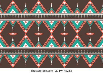 The fabric ethnic pattern of geometric shapes alternating dark red, green, and peach colors.