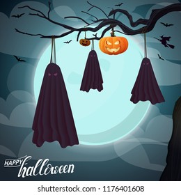 Fabric ghosts hanging from a branch