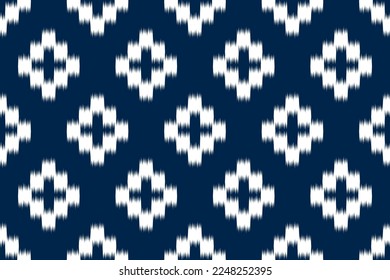 Fabric ikat pattern art. Geometric ethnic seamless pattern traditional. American, Mexican style. Design for background, wallpaper, illustration, fabric, clothing, carpet, textile, batik, embroidery.