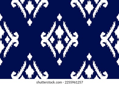 Fabric ikat pattern art. Geometric ethnic seamless pattern traditional. American, Mexican style. Design for background, wallpaper, illustration, fabric, clothing, carpet, textile, batik, embroidery.