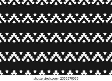 Fabric ikat pattern art. Geometric ethnic seamless pattern traditional. American, Mexican style. Design for background, wallpaper, illustration, fabric, clothing, carpet, textile, batik, embroidery.
