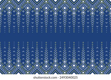 Fabric pixel abstract geometric pattern Thai stye on blue background. Design for clothing, fabric, background, wallpaper, wrapping, batik. Knitwear, Embroidery style. Aztec geometric art ornament