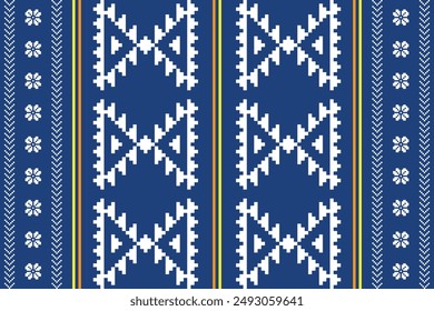 Fabric pixel abstract geometric pattern on blue background. Design for clothing, fabric, background, wallpaper, wrapping, batik. Knitwear, Embroidery style. Aztec geometric art ornament