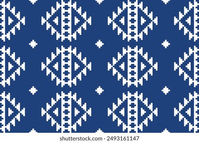 Fabric pixel abstract geometric pattern on blue background. Design for clothing, fabric, background, wallpaper, wrapping, batik. Knitwear, Embroidery style. Aztec geometric art ornament