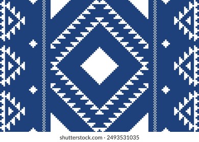 Fabric pixel abstract geometric pattern on blue background. Design for clothing, fabric, background, wallpaper, wrapping, batik. Knitwear, Embroidery style. Aztec geometric art ornament